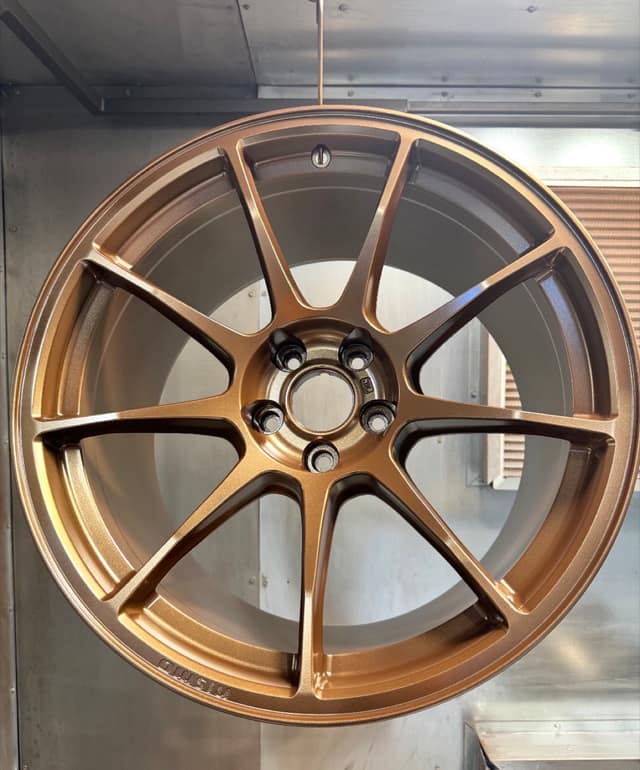 Ten-spoke wheel powder coated in bronze