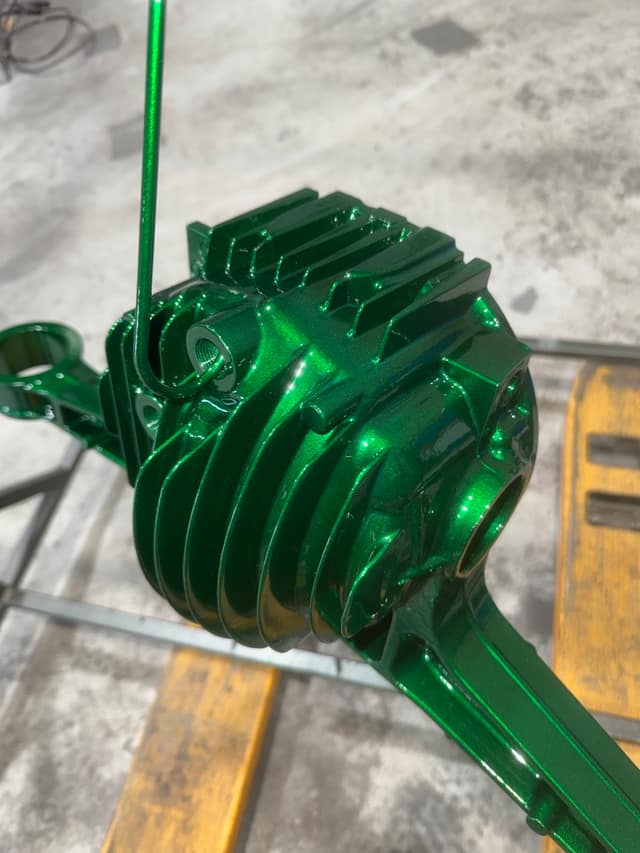 Differential housing powder coated in candy green